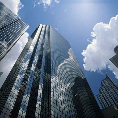Skyscraper building reflecting clouds